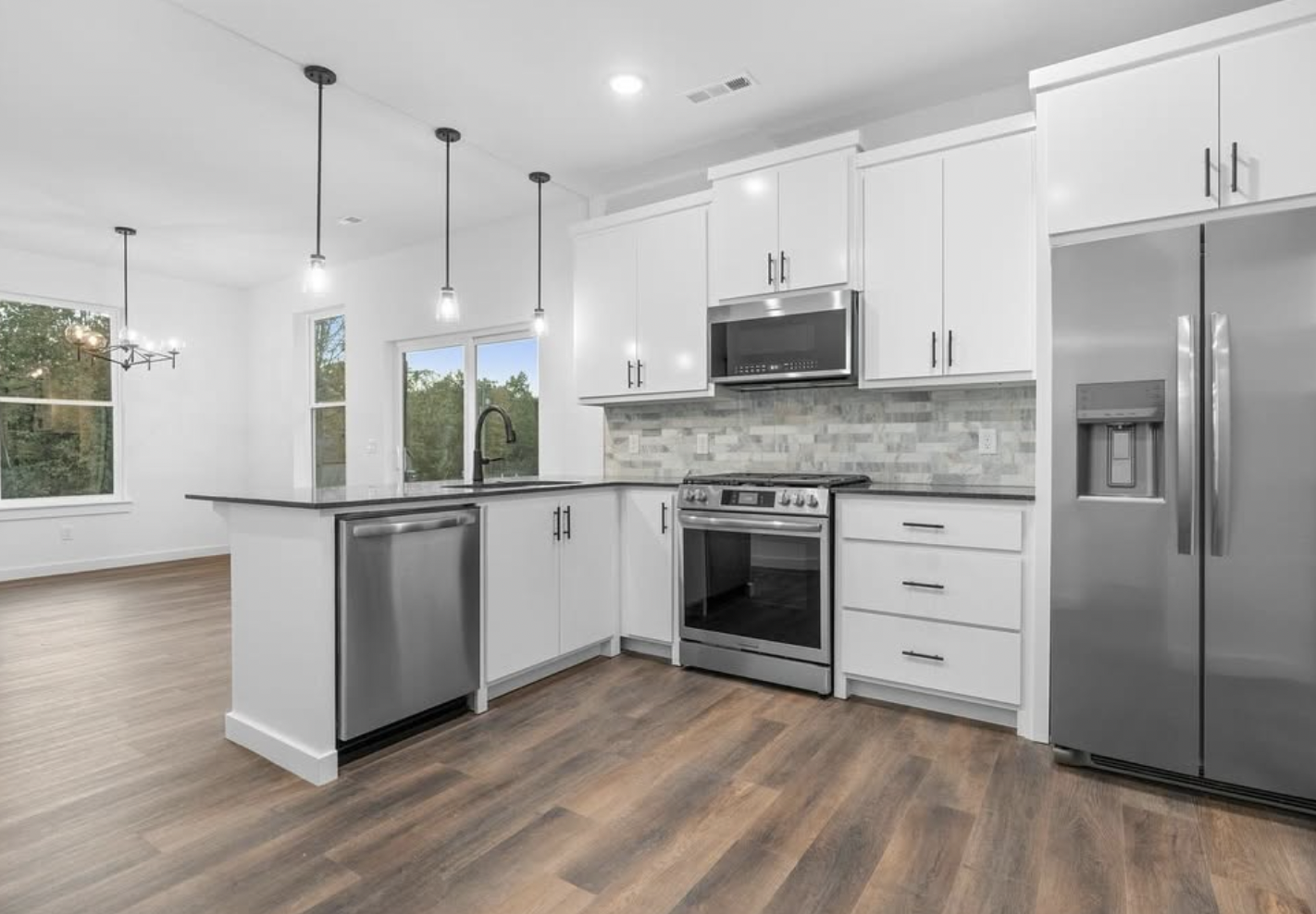 Open kitchen with marble backsplash